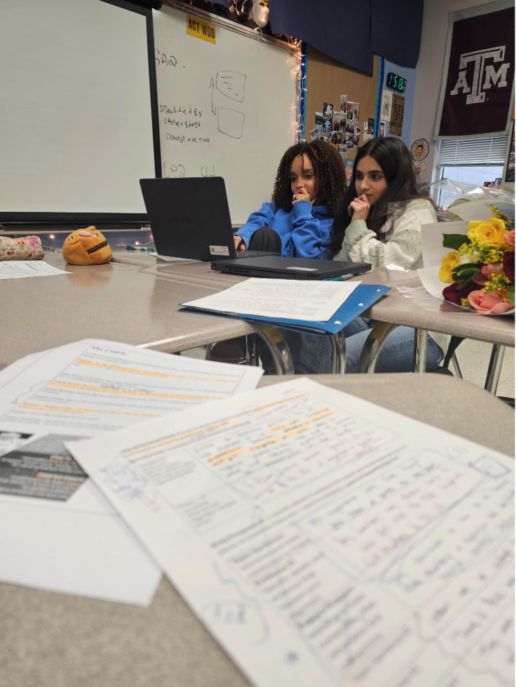 11th Grade Students Reviewing Feedback